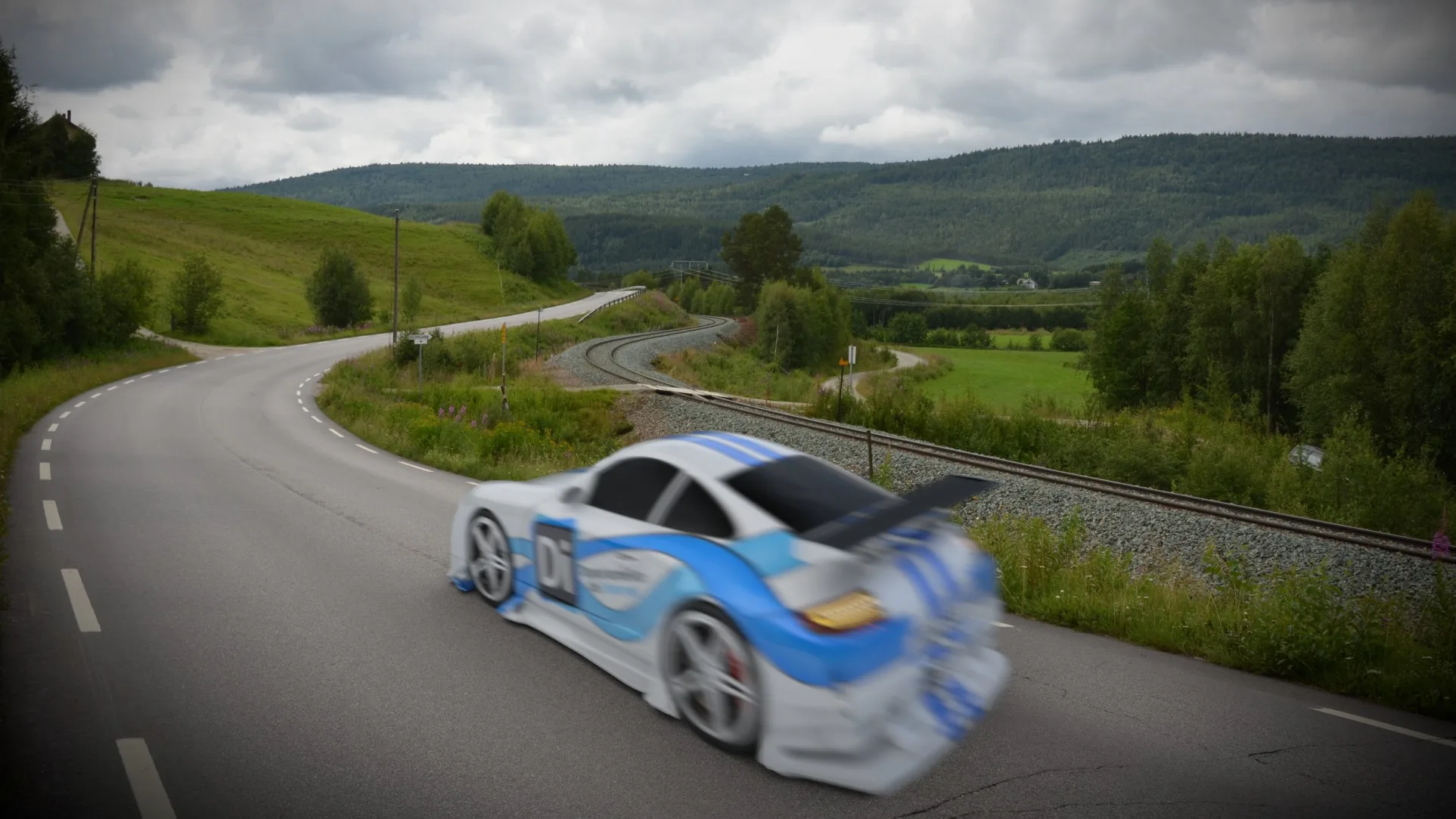 A white and blue sports car, blurred by speed, on a curving country road with green hills and a cloudy sky behind it.
