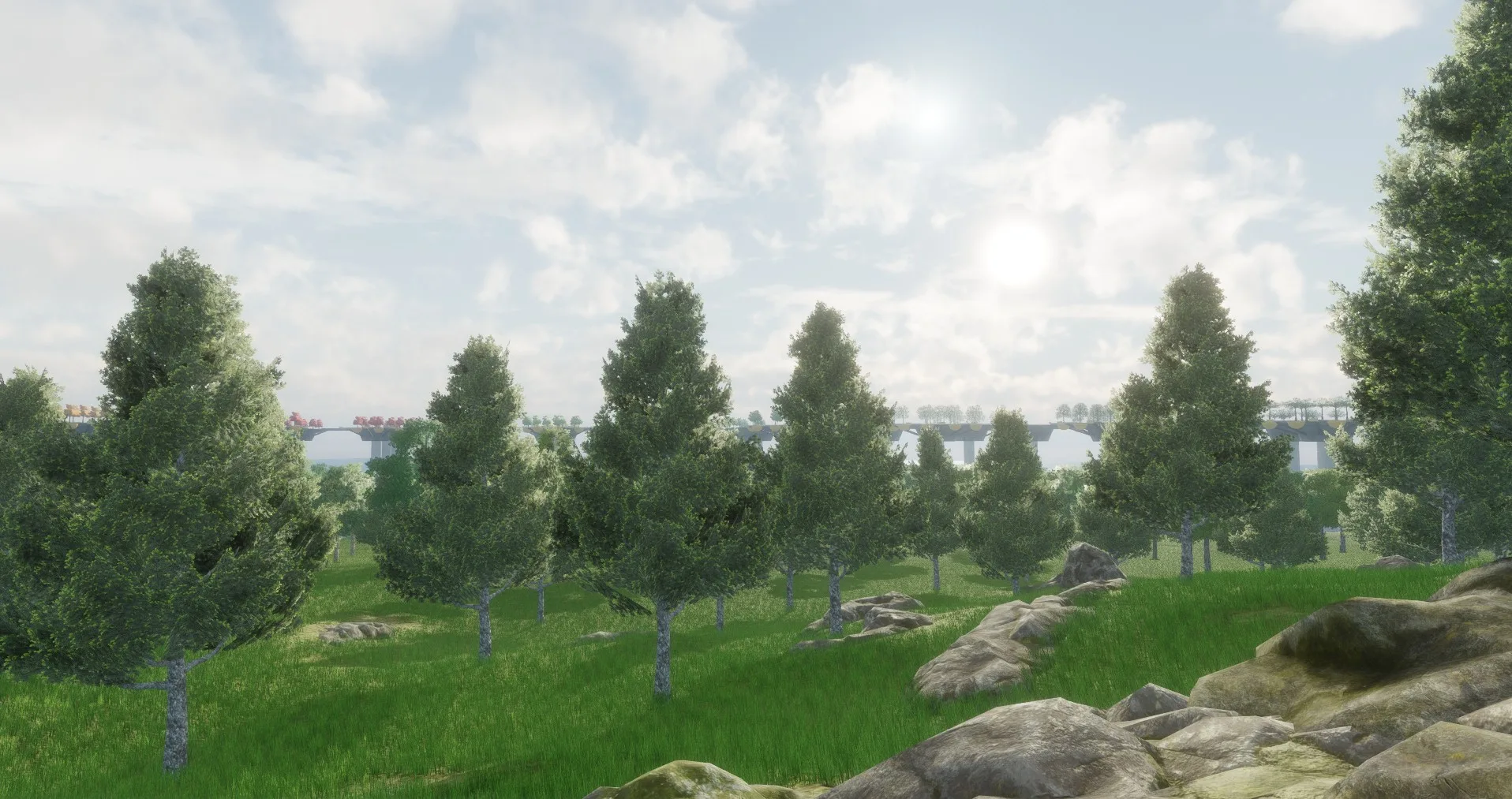 Conifers and a rocky outcrop in a grassy landscape under a sunlit sky, with a walkway far in the distance.